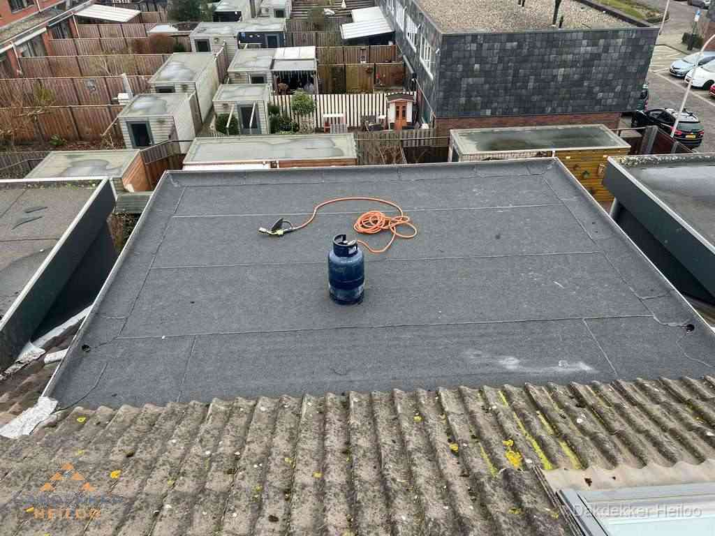 Dakreparatie plat dak met bitumen in Heiloo Dakreparatie plat dak met bitumen in Heiloo
